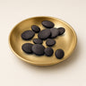 Silk Kapota Buttons in a gold dish