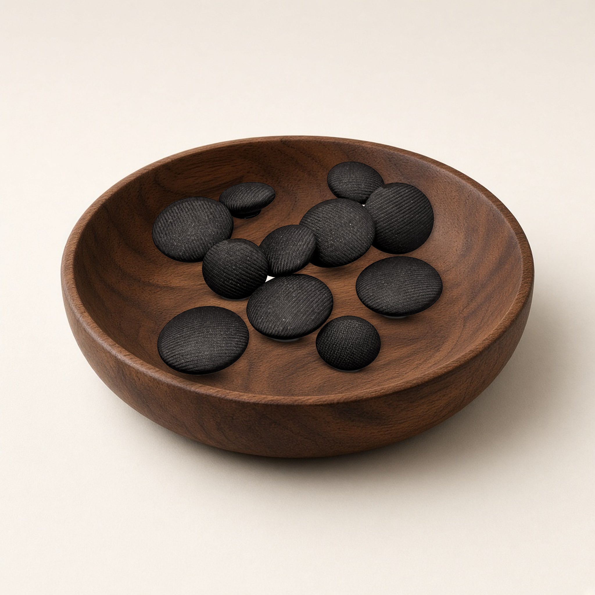 Wool Kapota Buttons in a brown dish