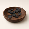 Wool Kapota Buttons in a brown dish