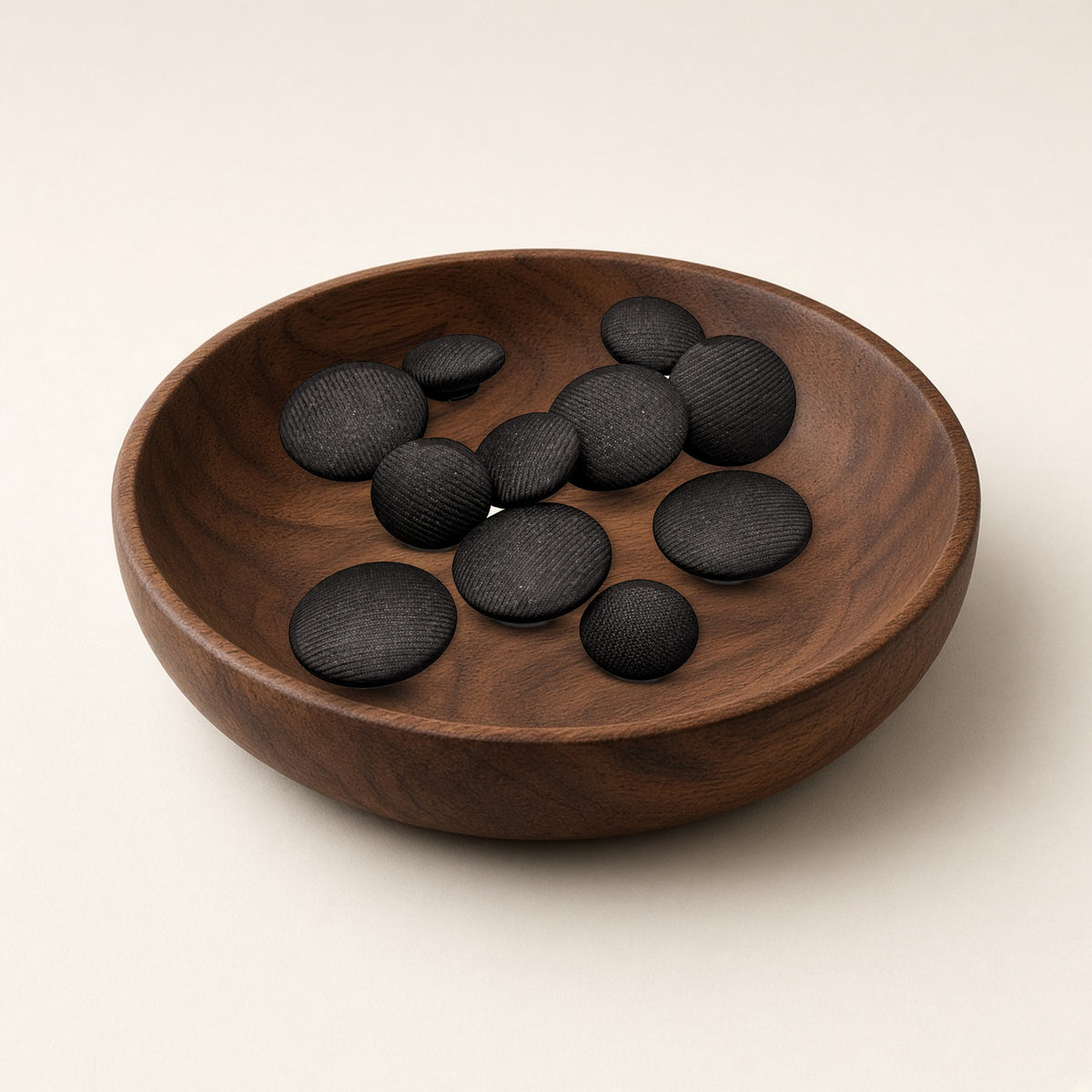 Wool Kapota Buttons in a brown dish